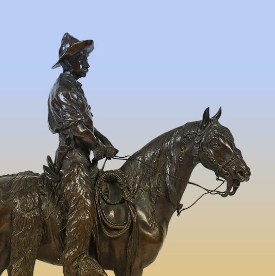 A cast bronze of the artist Walter Winans, as a cowboy, riding the Arab stallion Skowronek