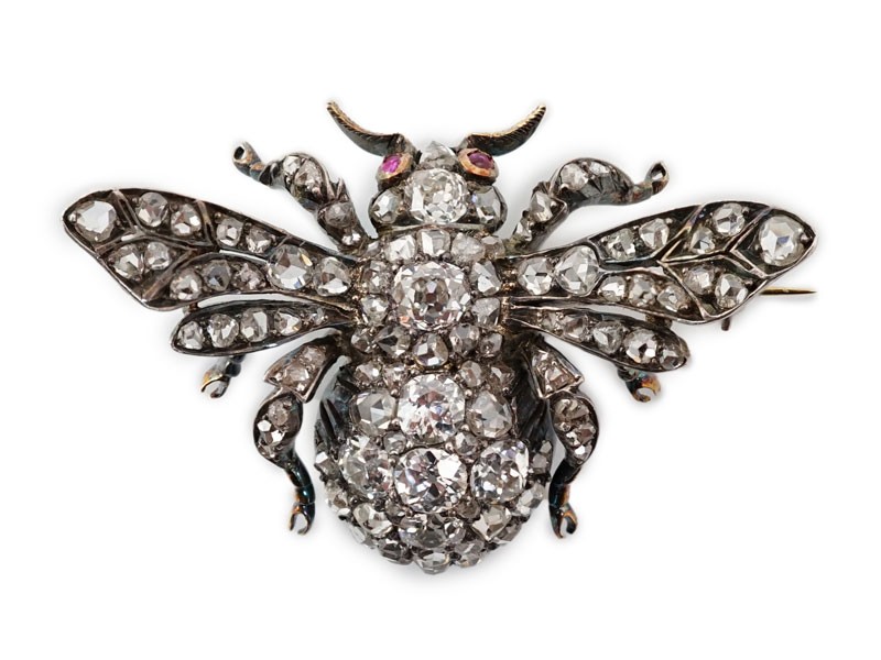 A Victorian gold, silver and diamond encrusted bee brooch