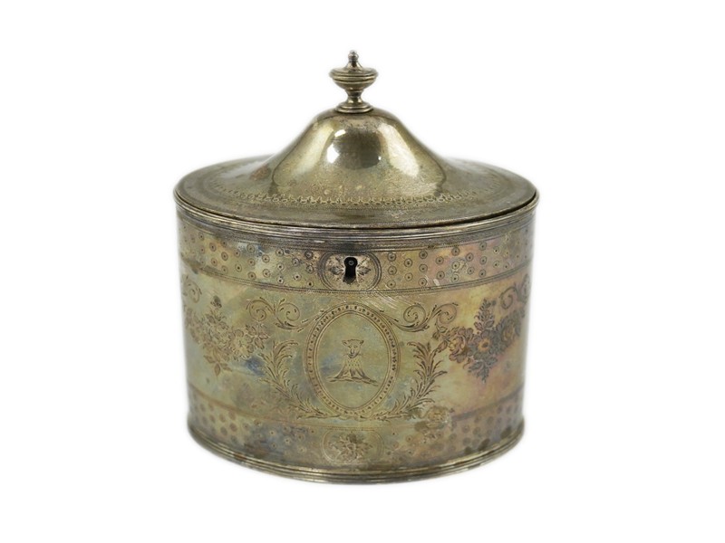 A George III silver oval tea caddy by Hester Bateman