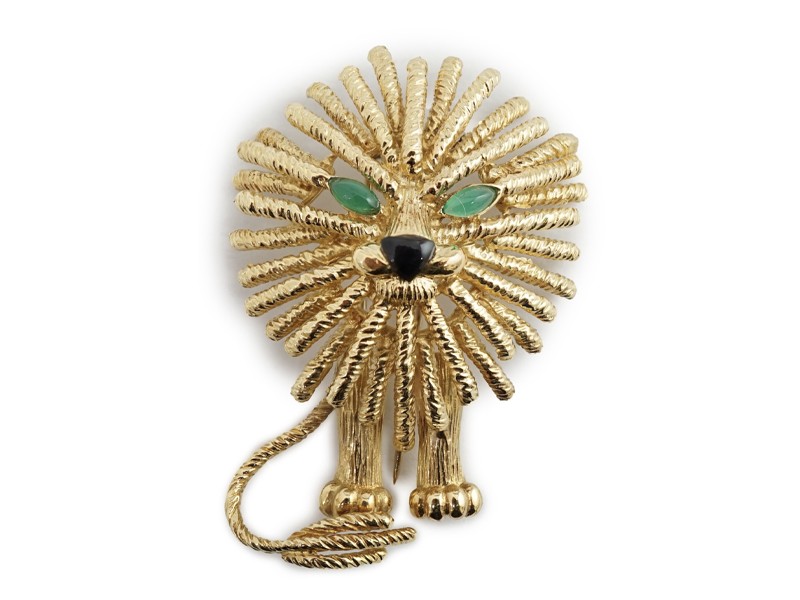 A stylised gold (tests as 18k) 'Lion King' clip brooch set chrysoprase and black enamel